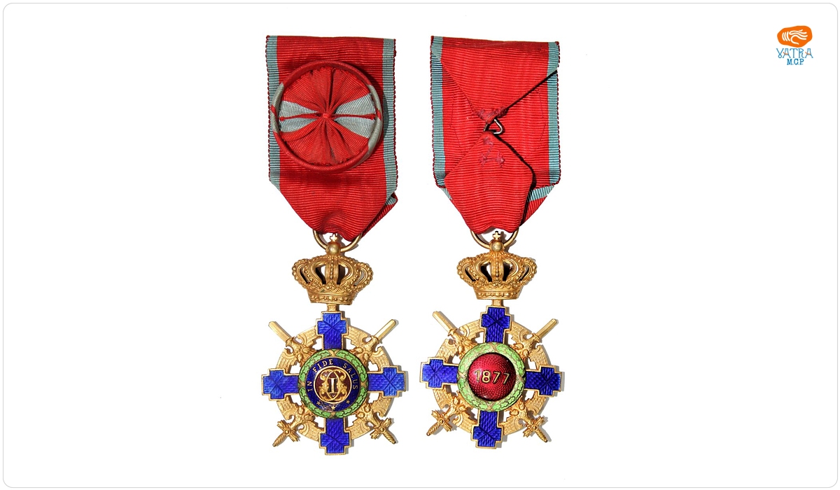 Ordinul „Steaua României”, cu spade și panglică de „Virtute militară”, în grad de ofițer