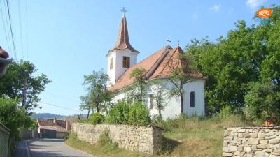 Biserica reformată din Porumbenii Mari – frescele medievale și blazonul angevin