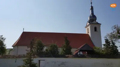 Biserica romano-catolică din Bisericani – portalul romanic și clopotul din 1626