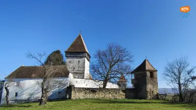 Biserica evanghelică din Hosman – bazilica romanică și cetatea cu șase turnuri