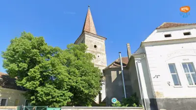 Biserica evanghelică din satul Nou, Sibiu – reliefurile romanice și turnul fortificat